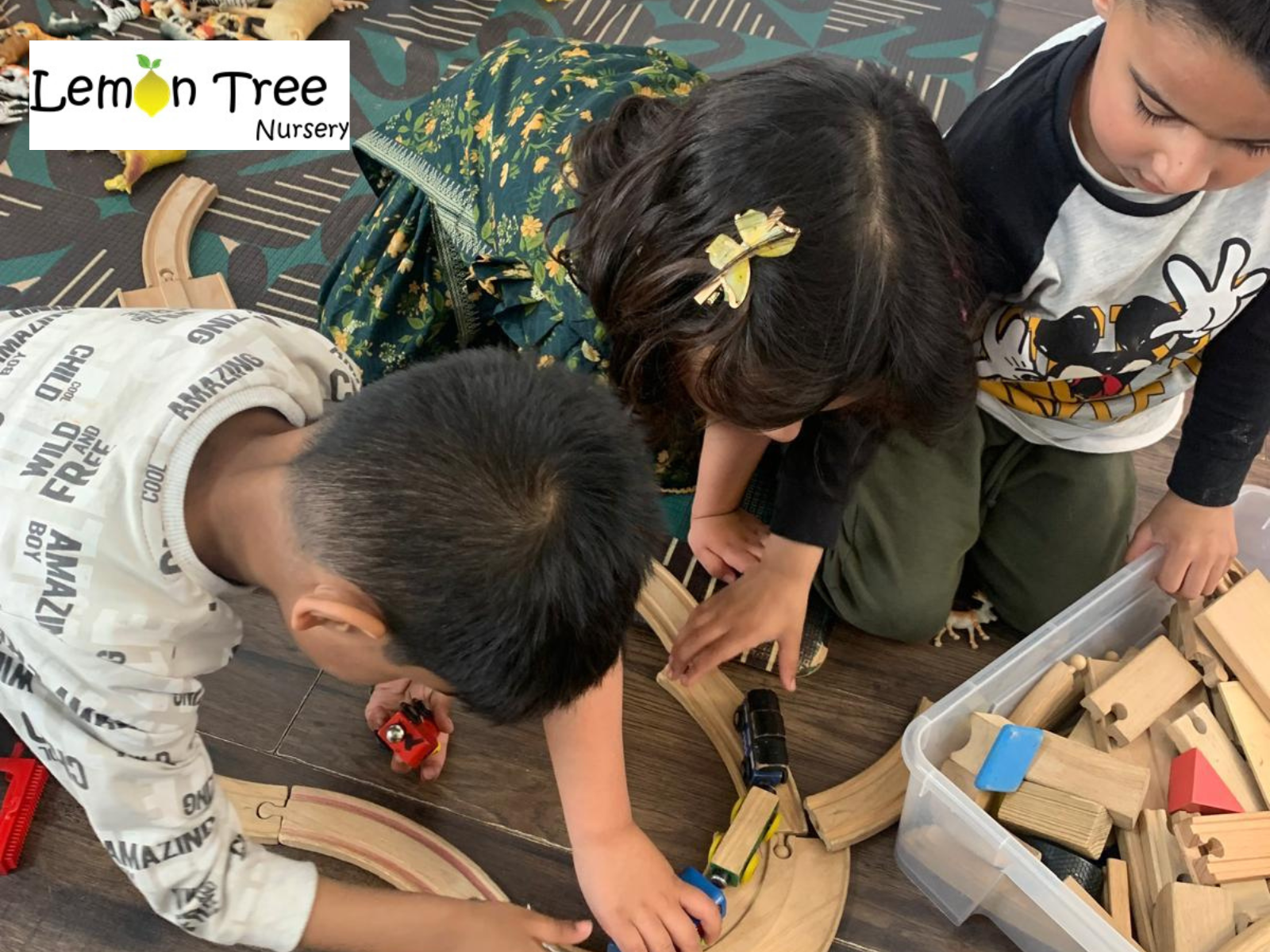 Kids playing with puzzle train