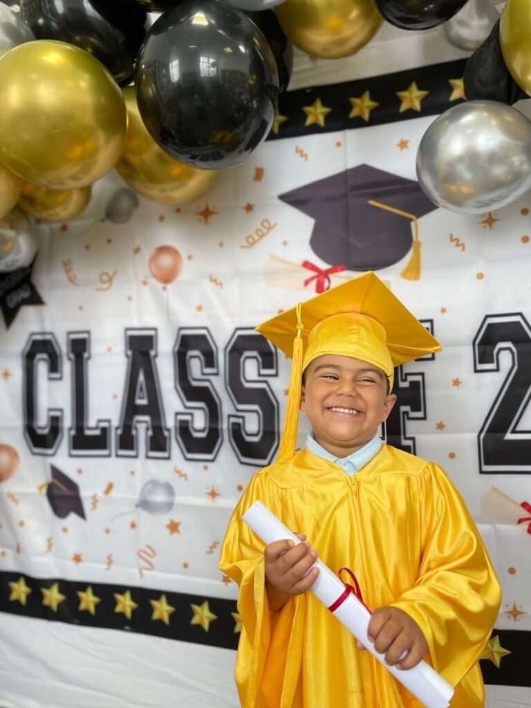 A student with degree in hand